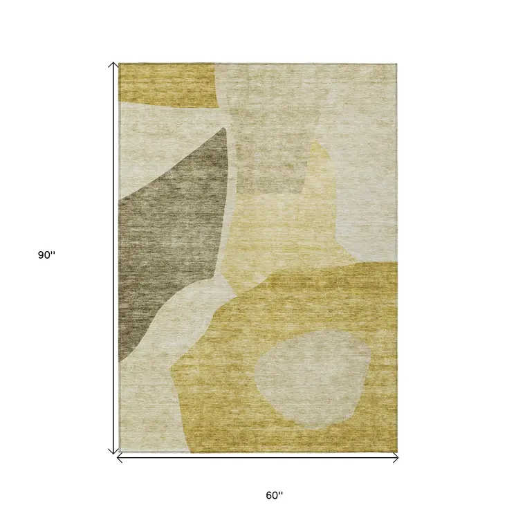 5' X 8' Gold Beige And Wheat Abstract Washable Indoor Outdoor Area Rug