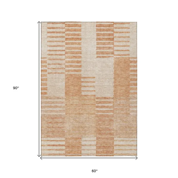 5' X 8' Salmon Peach And Ivory Striped Washable Indoor Outdoor Area Rug
