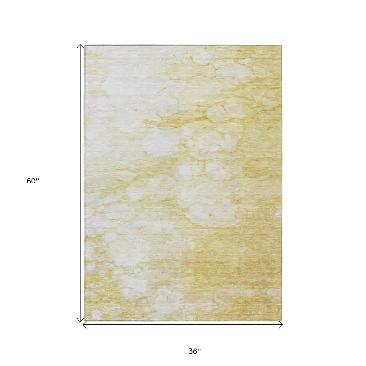 3' X 5' Gold Beige And Ivory Abstract Washable Indoor Outdoor Area Rug