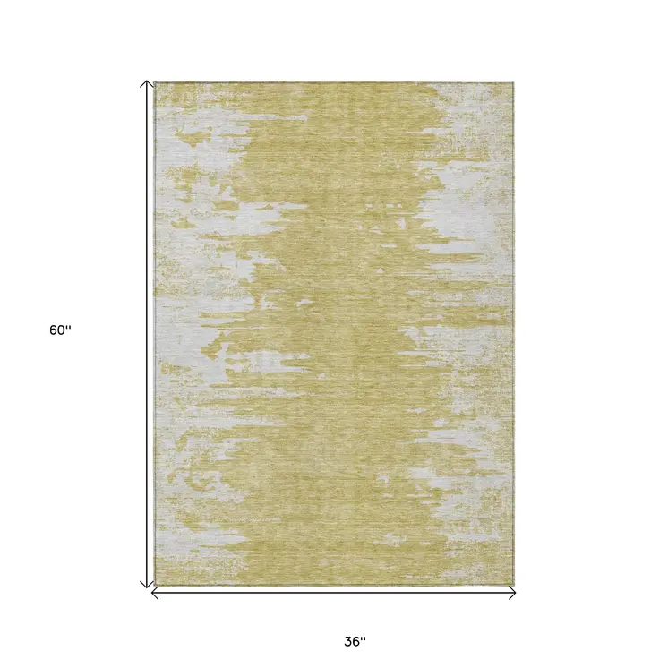 3' X 5' Gold And Ivory Abstract Washable Indoor Outdoor Area Rug