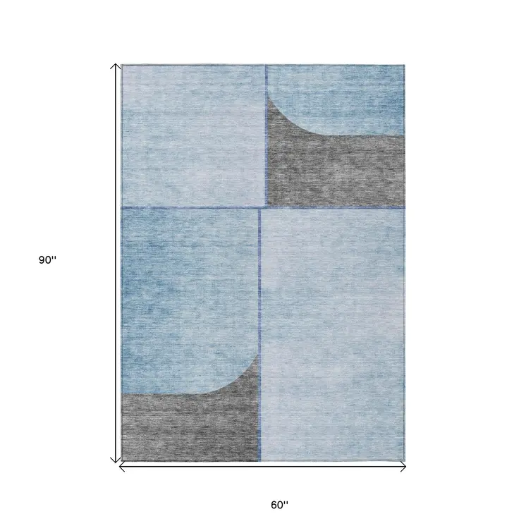 5' X 8' Sky Blue And Denim Blue Abstract Washable Indoor Outdoor Area Rug