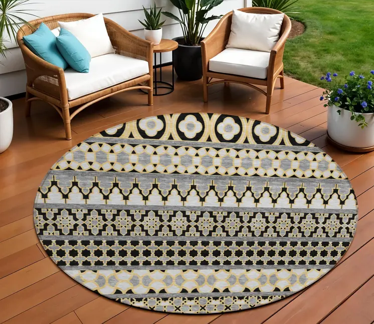 8' Charcoal Gray And Gold Round Quatrefoil Washable Indoor Outdoor Area Rug