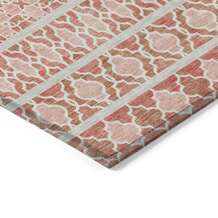 10' X 14' Salmon Beige And Copper Quatrefoil Washable Indoor Outdoor Area Rug