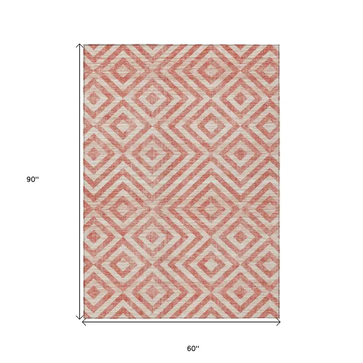 5' X 8' Salmon And Ivory Geometric Washable Indoor Outdoor Area Rug