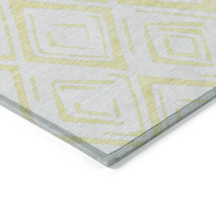 5' X 8' Yellow And Ivory Geometric Washable Indoor Outdoor Area Rug