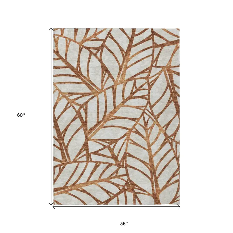 3' X 5' Orange Beige And Copper Floral Washable Indoor Outdoor Area Rug