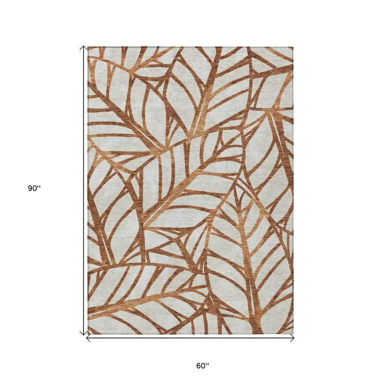 5' X 8' Orange Beige And Copper Floral Washable Indoor Outdoor Area Rug
