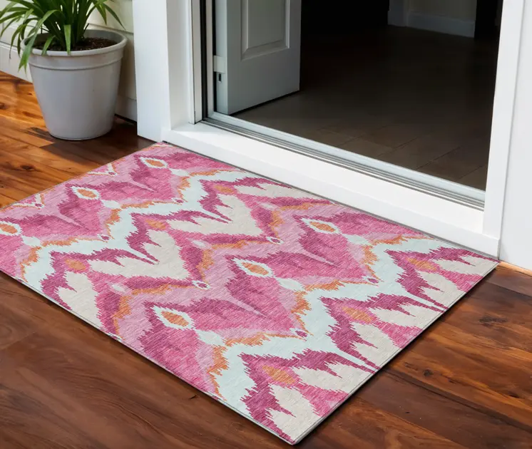 3' X 5' Pink Mauve And Orange Ikat Washable Indoor Outdoor Area Rug
