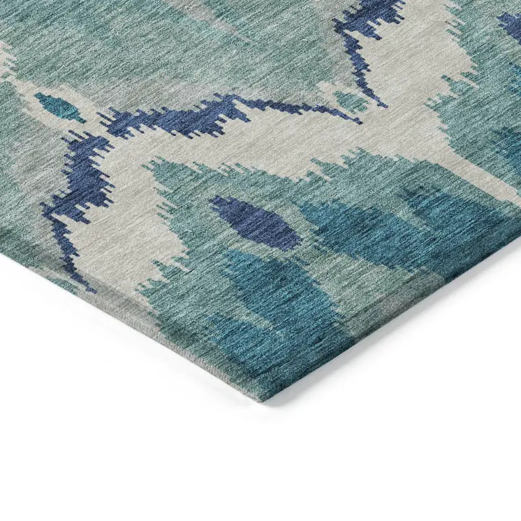 8' Teal Blue Navy Blue And Ivory Round Ikat Washable Indoor Outdoor Area Rug