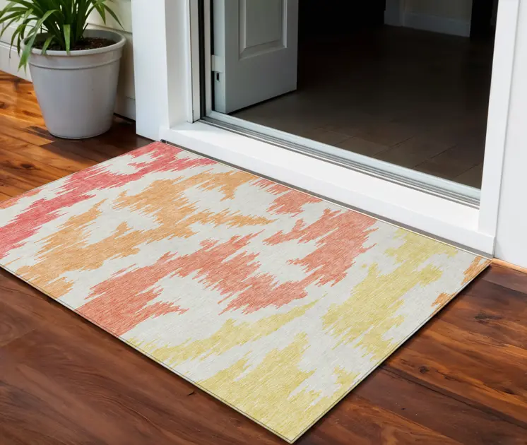 3' X 5' Coral Beige And Orange Abstract Washable Indoor Outdoor Area Rug