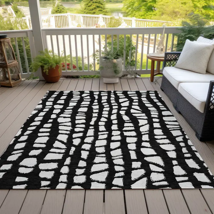 5' X 8' Black And Ivory Abstract Washable Indoor Outdoor Area Rug