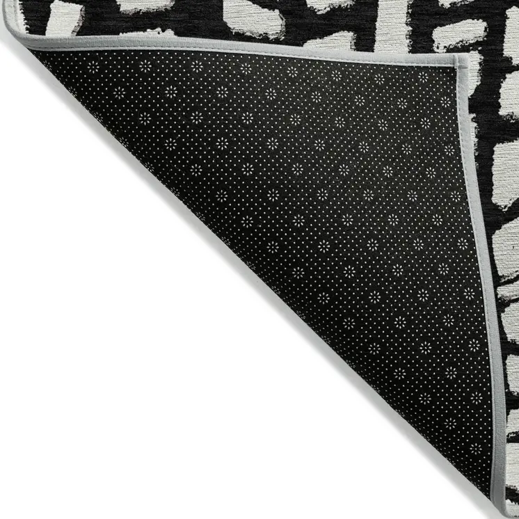 8' Black And Ivory Round Abstract Washable Indoor Outdoor Area Rug