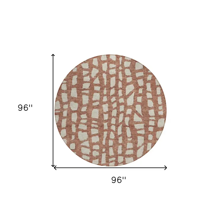 8' Orange And Ivory Round Abstract Washable Indoor Outdoor Area Rug