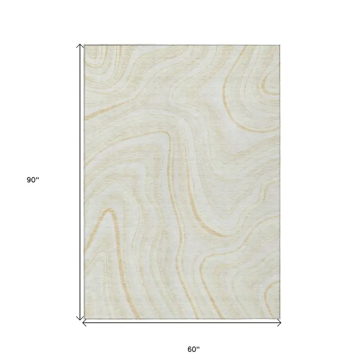 5' X 8' Ivory Beige And Tan Abstract Washable Indoor Outdoor Area Rug