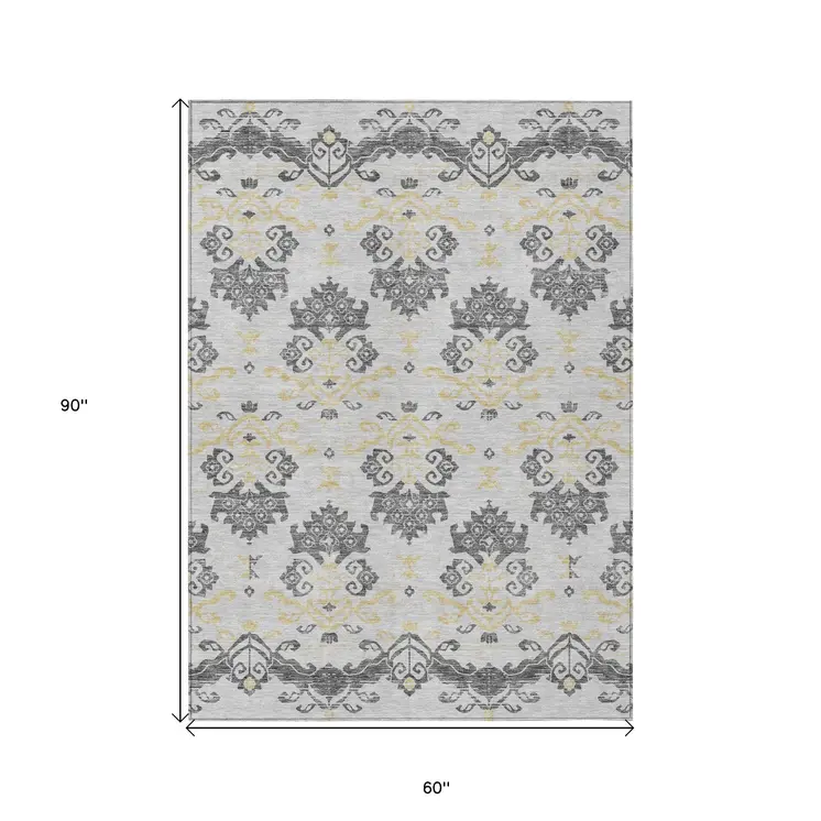 5' X 8' Charcoal Silver And Gold Oriental Washable Indoor Outdoor Area Rug