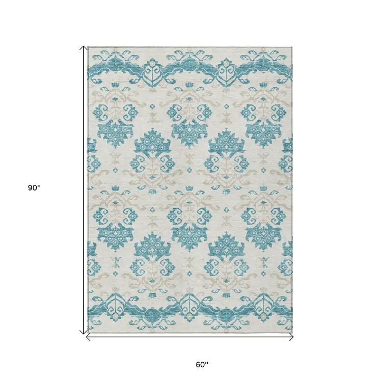 5' X 8' Teal Blue Silver And Gray Oriental Washable Indoor Outdoor Area Rug