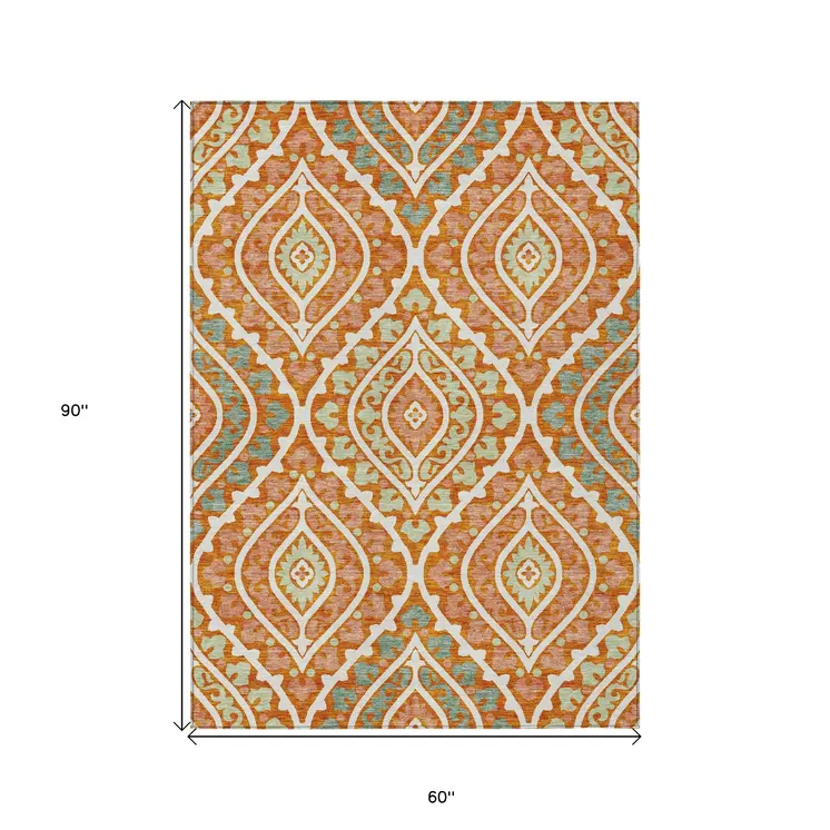 5' X 8' Orange Peach And Ivory Floral Washable Indoor Outdoor Area Rug