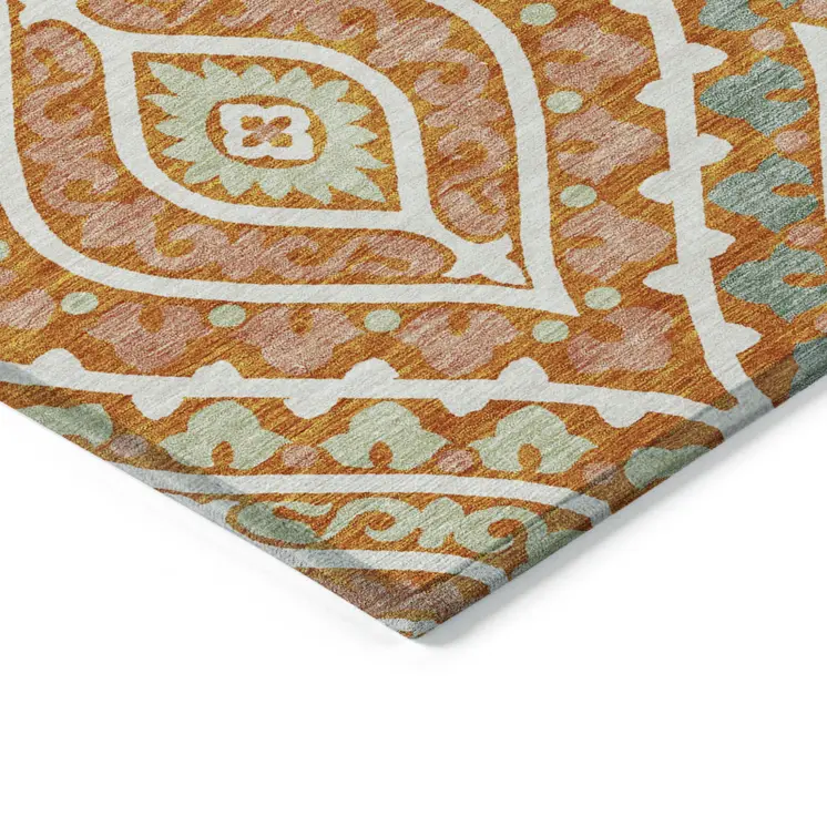 5' X 8' Orange Peach And Ivory Floral Washable Indoor Outdoor Area Rug