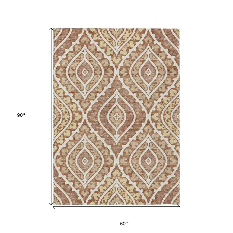 5' X 8' Orange Gold And Ivory Floral Washable Indoor Outdoor Area Rug