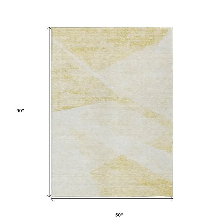 5' X 8' Gold Beige And Ivory Abstract Washable Indoor Outdoor Area Rug