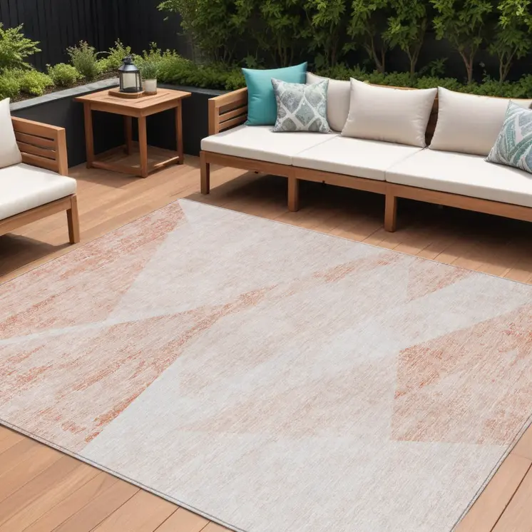 9' X 12' Salmon Peach And Ivory Abstract Washable Indoor Outdoor Area Rug