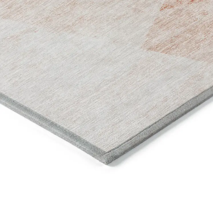 9' X 12' Salmon Peach And Ivory Abstract Washable Indoor Outdoor Area Rug