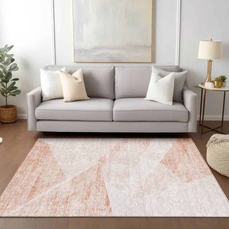 9' X 12' Salmon Peach And Ivory Abstract Washable Indoor Outdoor Area Rug