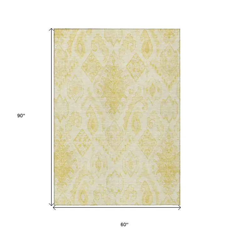 5' X 8' Gold Ivory And Beige Moroccan Washable Indoor Outdoor Area Rug