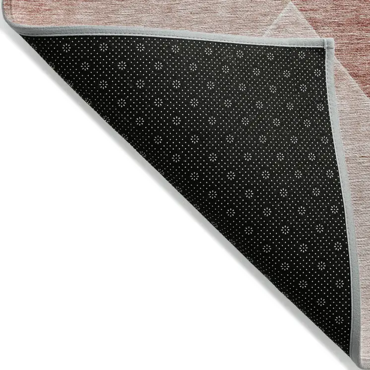 5' X 8' Salmon And Ivory Abstract Washable Indoor Outdoor Area Rug