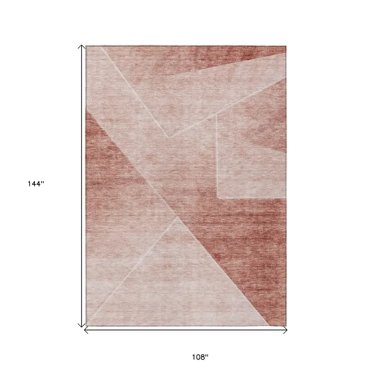 9' X 12' Salmon And Ivory Abstract Washable Indoor Outdoor Area Rug
