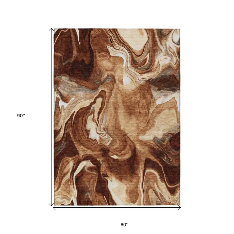 5' X 8' Orange Copper And Ivory Abstract Washable Indoor Outdoor Area Rug