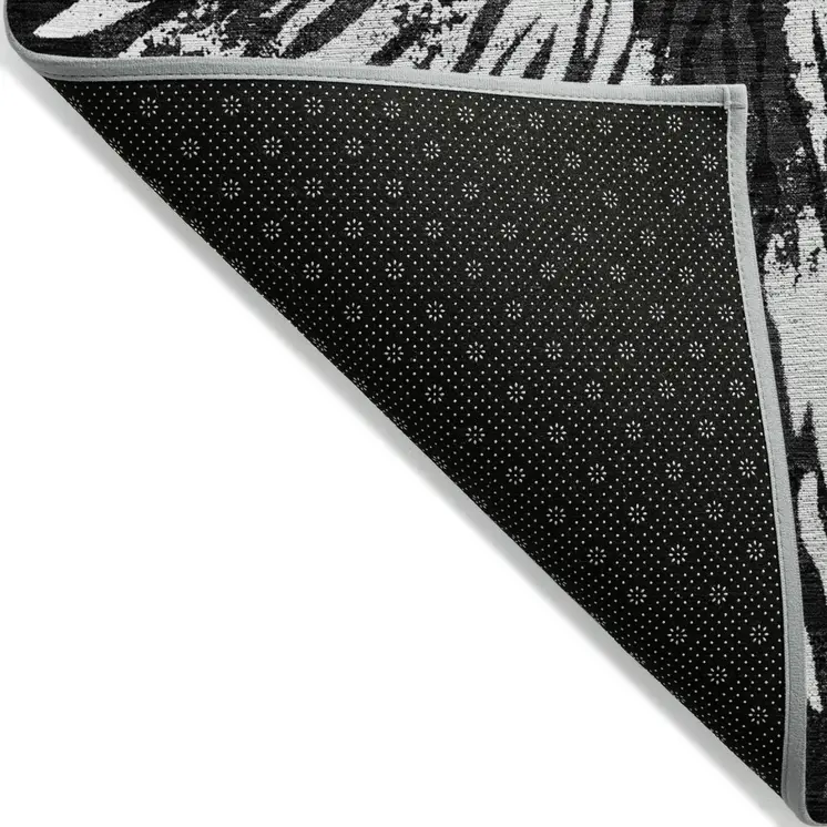 9' X 12' Black Charcoal And Ivory Abstract Washable Indoor Outdoor Area Rug