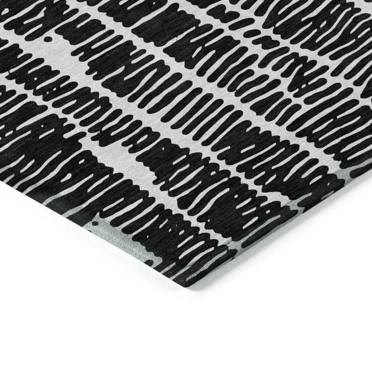 3' X 5' Black And Ivory Abstract Washable Indoor Outdoor Area Rug