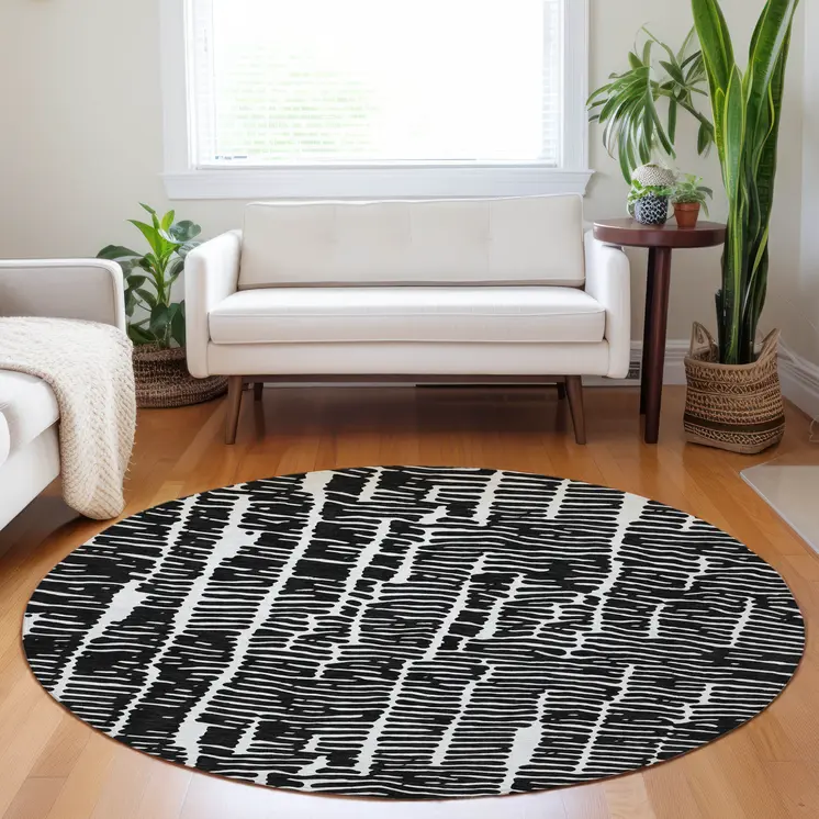 8' Black And Ivory Round Abstract Washable Indoor Outdoor Area Rug