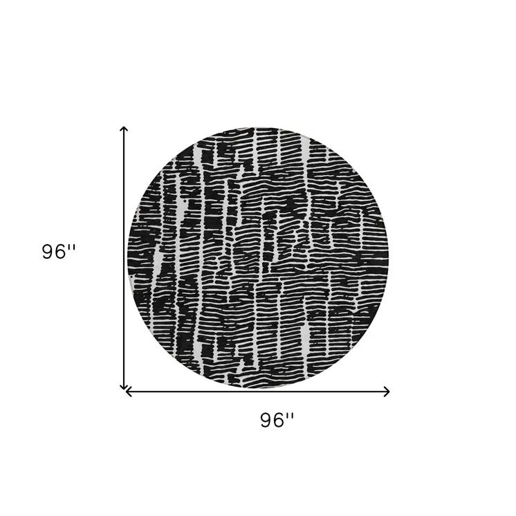 8' Black And Ivory Round Abstract Washable Indoor Outdoor Area Rug