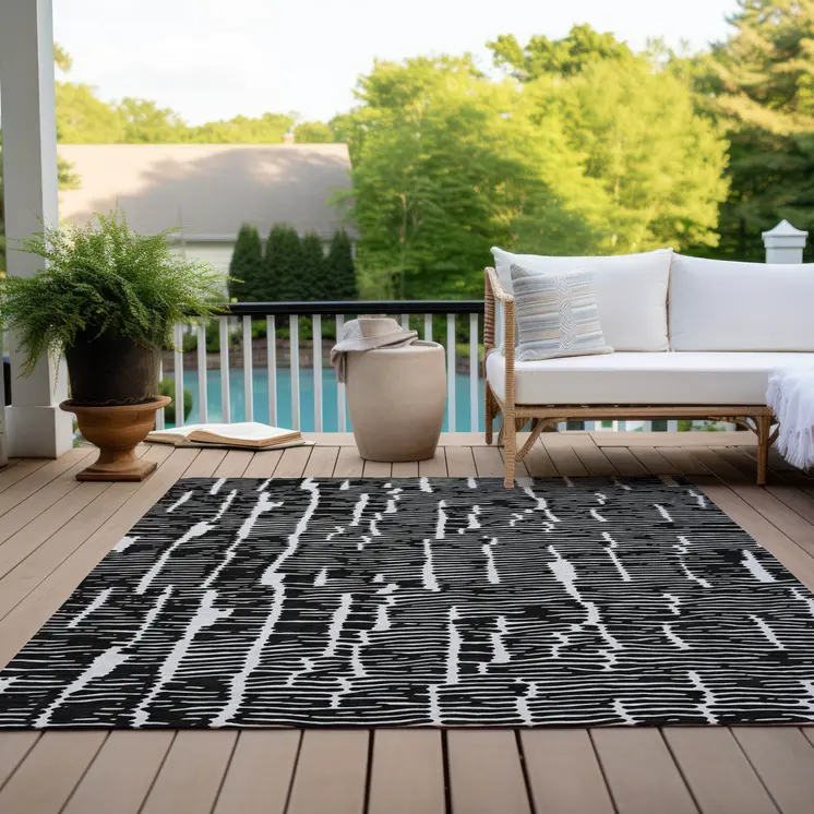 9' X 12' Black And Ivory Abstract Washable Indoor Outdoor Area Rug