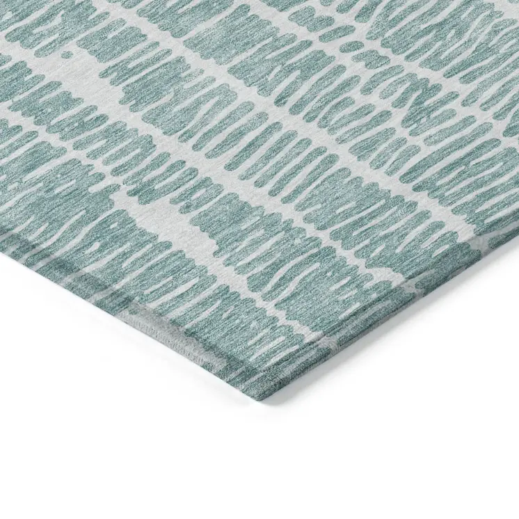 9' X 12' Teal Blue And Ivory Abstract Washable Indoor Outdoor Area Rug