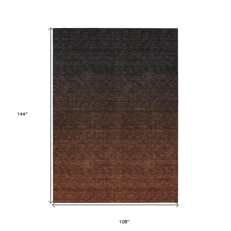 9' X 12' Orange And Charcoal Abstract Washable Indoor Outdoor Area Rug