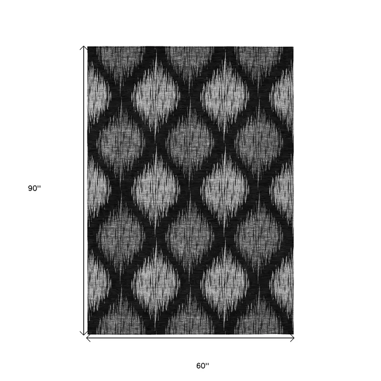 5' X 8' Black Silver And Gray Ikat Washable Indoor Outdoor Area Rug