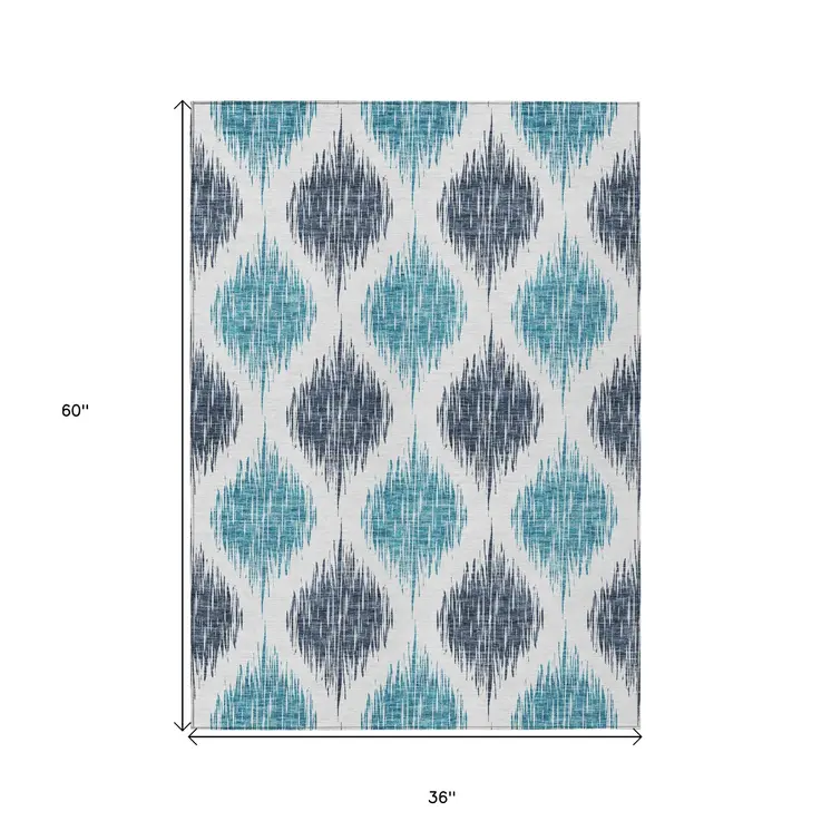3' X 5' Teal Blue And Ivory Ikat Washable Indoor Outdoor Area Rug