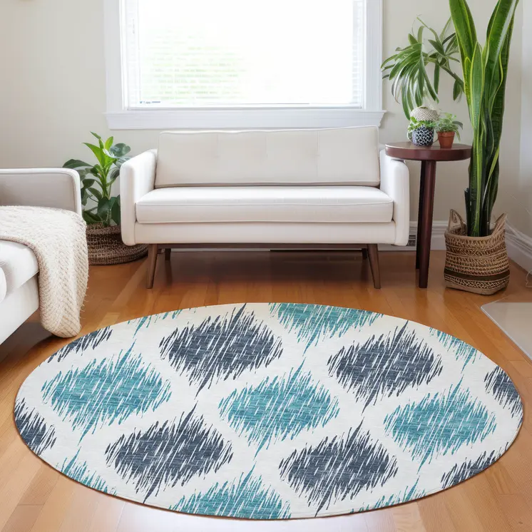 8' Teal Blue And Ivory Round Ikat Washable Indoor Outdoor Area Rug
