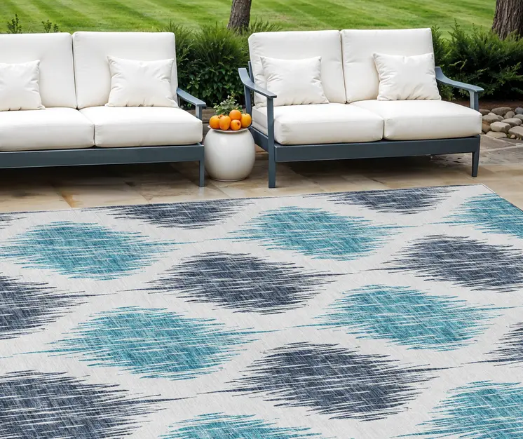 10' X 14' Teal Blue And Ivory Ikat Washable Indoor Outdoor Area Rug