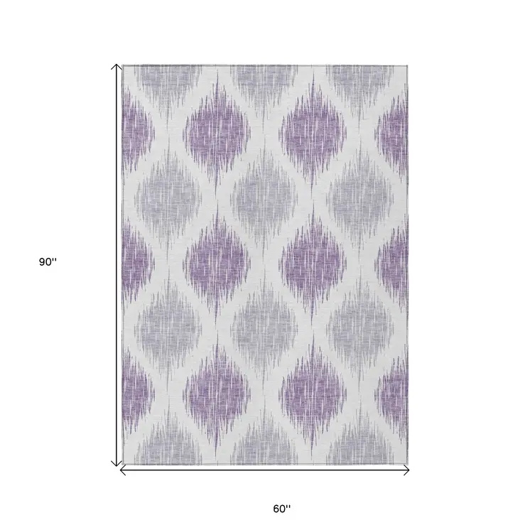 5' X 8' Lavender Purple And Ivory Ikat Washable Indoor Outdoor Area Rug