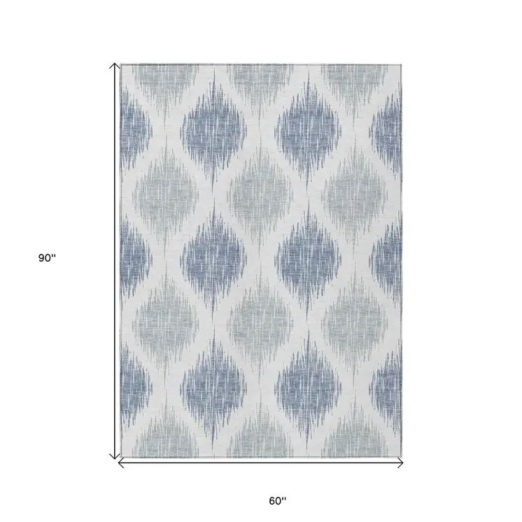 5' X 8' Sky Blue Ivory And Denim Blue Ikat Washable Indoor Outdoor Area Rug