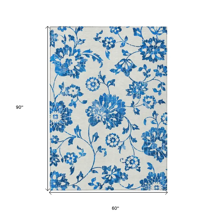 5' X 8' White And Denim Blue Floral Washable Indoor Outdoor Area Rug