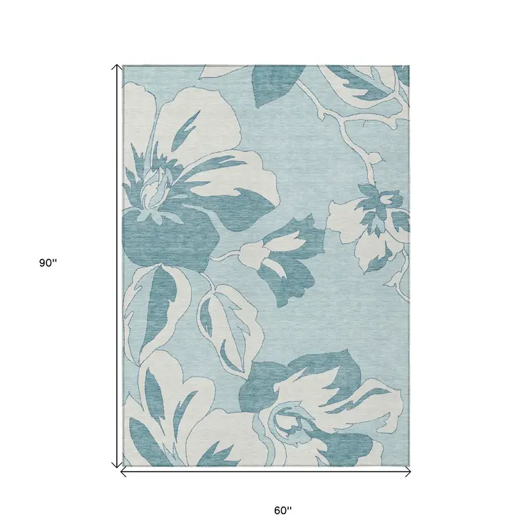 5' X 8' Teal Blue Aqua And Ivory Floral Washable Indoor Outdoor Area Rug