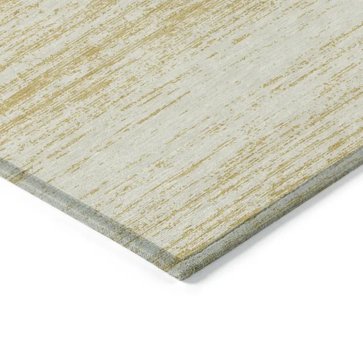 5' X 8' Gold And Ivory Striped Washable Indoor Outdoor Area Rug