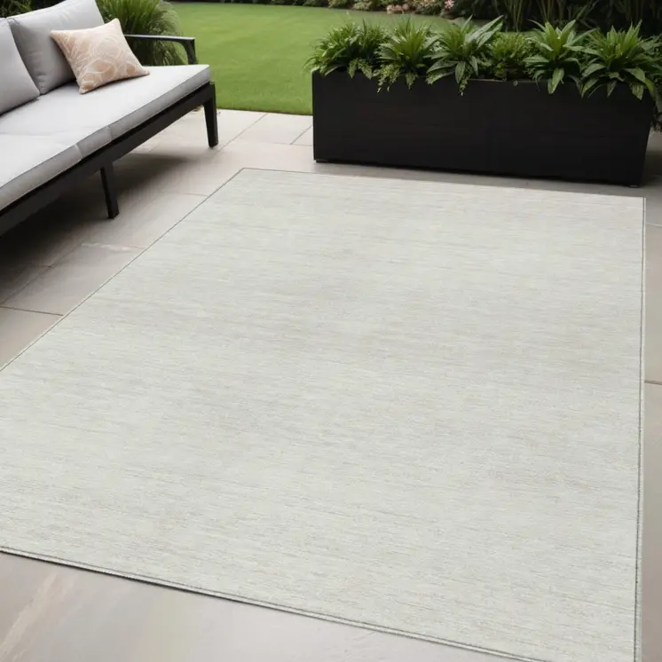 5' X 8' Ivory And Beige Striped Washable Indoor Outdoor Area Rug