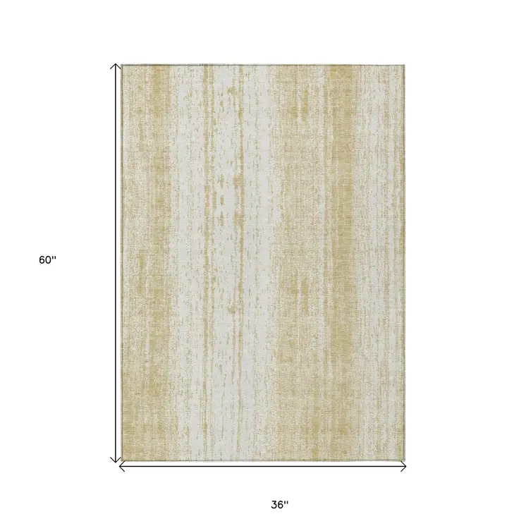 3' X 5' Gold And Ivory Striped Washable Indoor Outdoor Area Rug