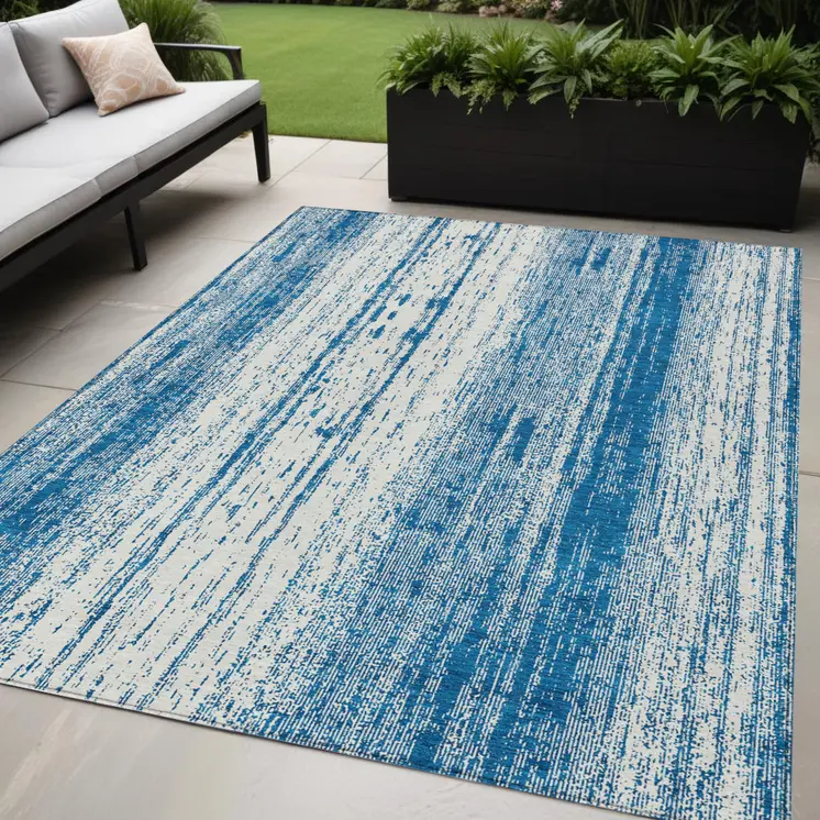 5' X 8' Navy Blue And Ivory Striped Washable Indoor Outdoor Area Rug